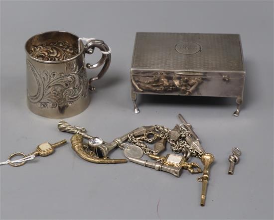 A small silver Christening mug, a silver trinket box, a silver watch chain and nine watch keys, including Georgian examples.